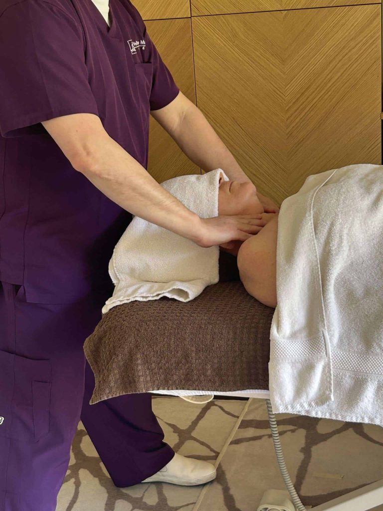 a client receiving a relaxing massage in Colchester
