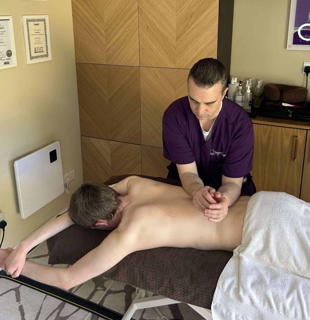 Andy performing therapeutic massage in Colchester at wellness massage Lexden