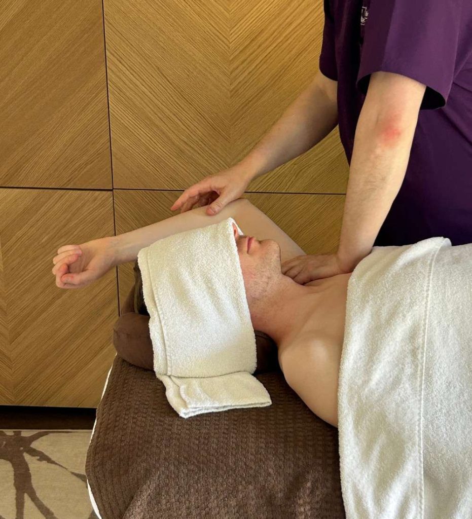 Massage being performed with stretching exercises